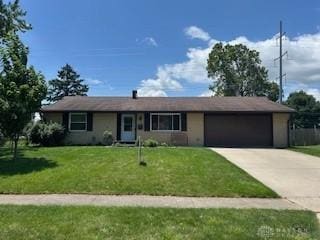 1006 Terracewood Dr, Englewood, OH 45322 - ranch-style home with a garage, concrete driveway, and a front yard