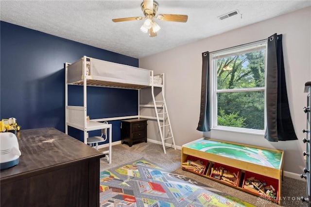 5545 Stone Path Dr, Middletown, OH 45042 - bedroom featuring carpet, a textured ceiling, and a ceiling fan