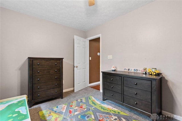 5545 Stone Path Dr, Middletown, OH 45042 - bedroom with carpet floors, ceiling fan, and a textured ceiling