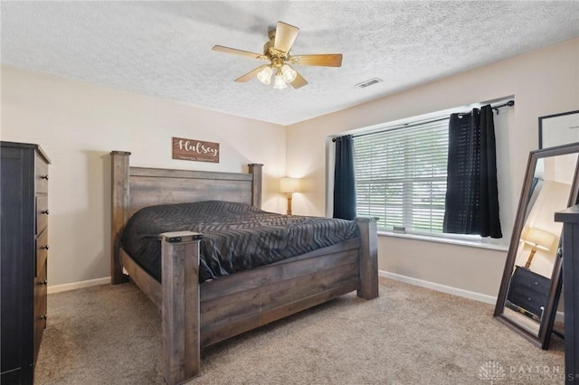 5545 Stone Path Dr, Middletown, OH 45042 - bedroom featuring carpet floors, a textured ceiling, and ceiling fan