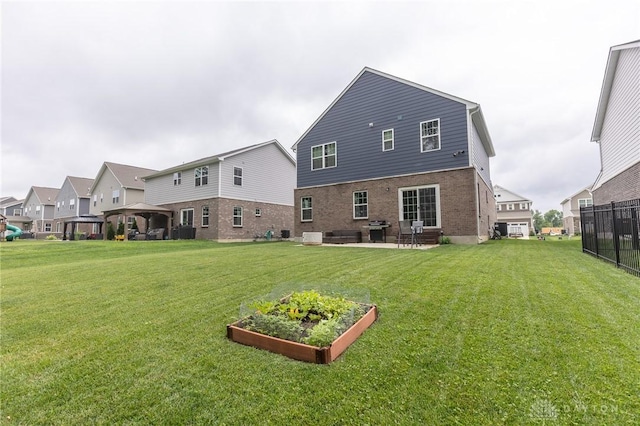 2225 Cold Stream Dr, Clearcreek Twp, OH 45458 - rear view of house featuring a gazebo, a lawn, and a garden