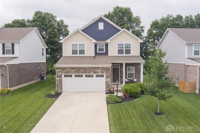 2225 Cold Stream Dr, Clearcreek Twp, OH 45458 - craftsman-style house with a garage, concrete driveway, a front yard, and covered porch