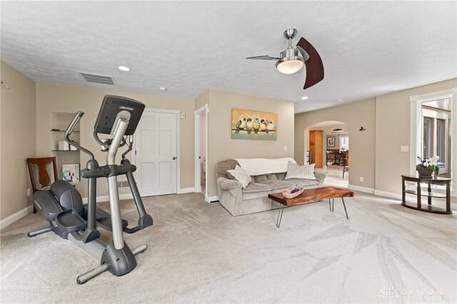 255 Belle Watlin Ct, Dayton, OH 45434 - exercise area with ceiling fan, arched walkways, carpet floors, a textured ceiling, and recessed lighting