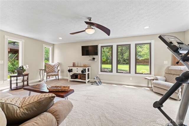 255 Belle Watlin Ct, Dayton, OH 45434 - carpeted living room with a ceiling fan, a textured ceiling, and recessed lighting