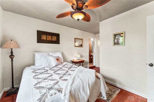 255 Belle Watlin Ct, Dayton, OH 45434 - bedroom with wood finished floors, a ceiling fan, and ensuite bath