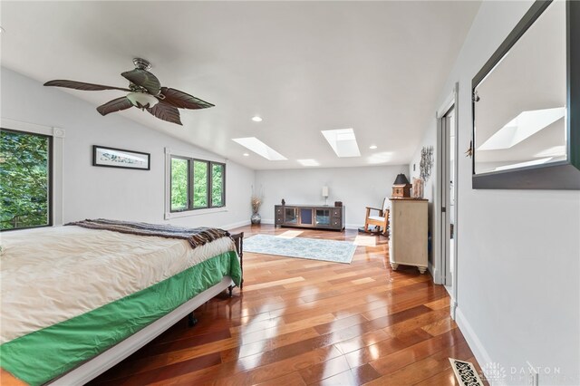 255 Belle Watlin Ct, Dayton, OH 45434 - bedroom with a skylight, vaulted ceiling, hardwood / wood-style floors, and recessed lighting