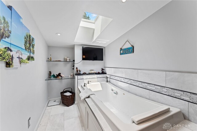 255 Belle Watlin Ct, Dayton, OH 45434 - bathroom featuring a skylight, a whirlpool tub, and recessed lighting