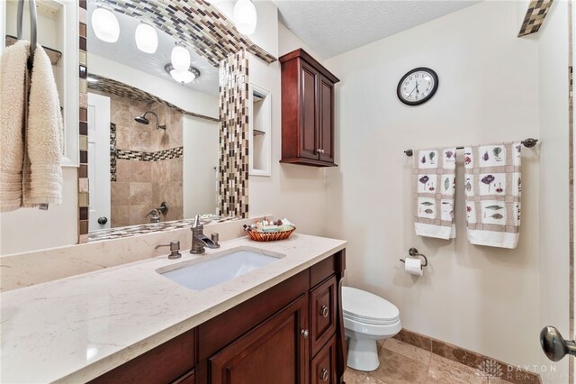 255 Belle Watlin Ct, Dayton, OH 45434 - bathroom featuring a shower, vanity, and tile patterned flooring