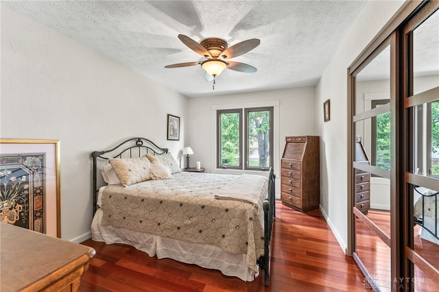 255 Belle Watlin Ct, Dayton, OH 45434 - bedroom featuring wood finished floors, a ceiling fan, and a textured ceiling
