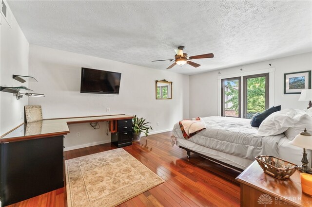 255 Belle Watlin Ct, Dayton, OH 45434 - bedroom with hardwood / wood-style flooring and a textured ceiling