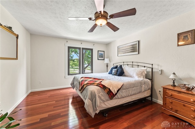 255 Belle Watlin Ct, Dayton, OH 45434 - bedroom with wood-type flooring, a textured ceiling, and ceiling fan