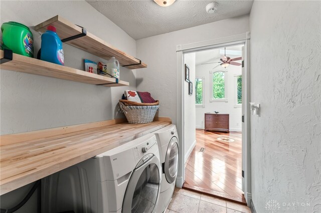 255 Belle Watlin Ct, Dayton, OH 45434 - laundry area featuring separate washer and dryer, a textured ceiling, a textured wall, and ceiling fan