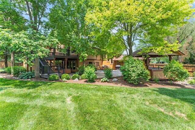255 Belle Watlin Ct, Dayton, OH 45434 - view of yard featuring a deck, stairway, and a patio area