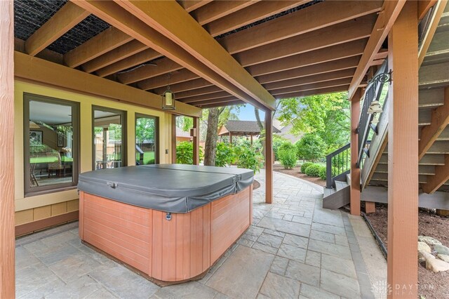 255 Belle Watlin Ct, Dayton, OH 45434 - view of patio featuring a hot tub and stairway