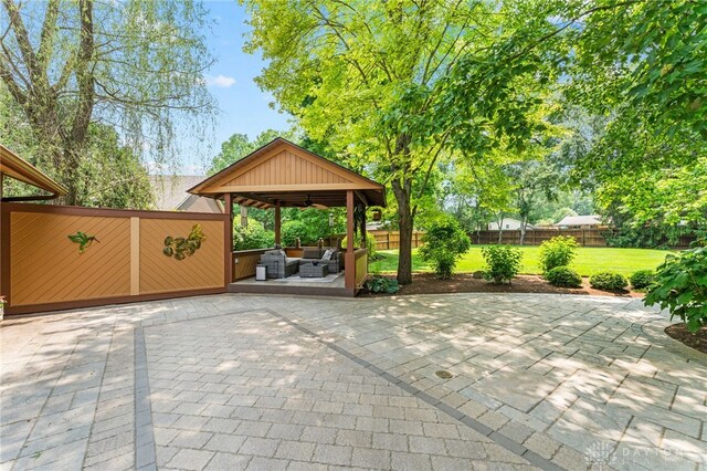 255 Belle Watlin Ct, Dayton, OH 45434 - fenced backyard featuring outdoor lounge area and a patio