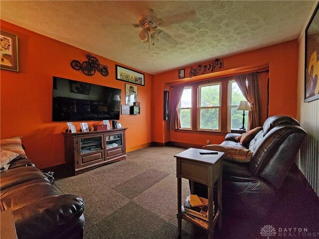 3054 Carpenter Rd, Jefferson Twp, OH 45335 - living area featuring carpet floors, a textured ceiling, and ceiling fan