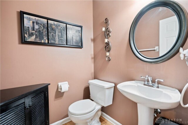 25 Huntley Ct, Springboro, OH 45066 - half bathroom featuring toilet and baseboards