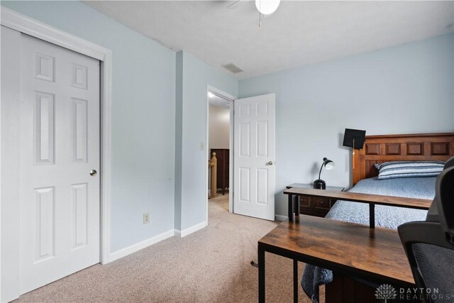 25 Huntley Ct, Springboro, OH 45066 - bedroom with light carpet and an office area