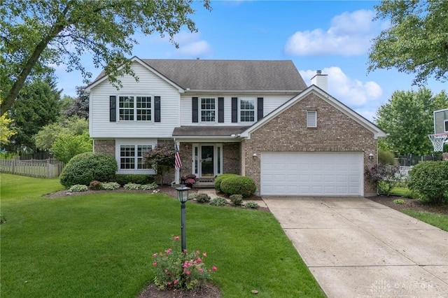 25 Huntley Ct, Springboro, OH 45066 - traditional home with concrete driveway, a chimney, brick siding, an attached garage, and a shingled roof