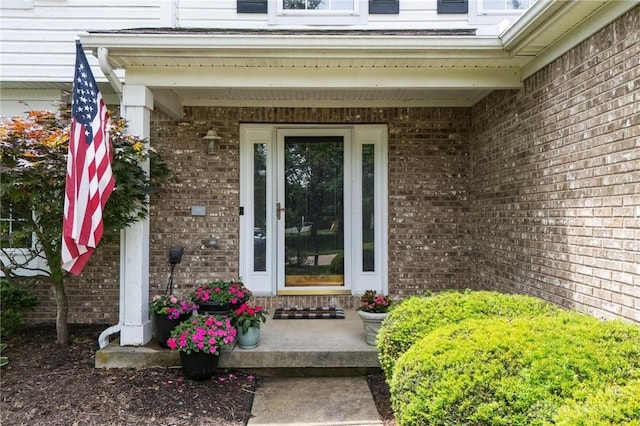 25 Huntley Ct, Springboro, OH 45066 - property entrance featuring brick siding and covered porch