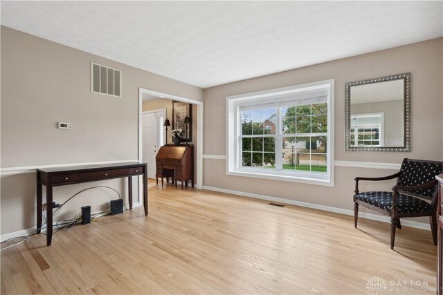 25 Huntley Ct, Springboro, OH 45066 - living area featuring light wood-style floors and baseboards