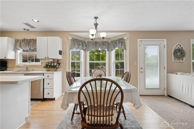 25 Huntley Ct, Springboro, OH 45066 - dining space with a chandelier, healthy amount of natural light, light wood-type flooring, and recessed lighting