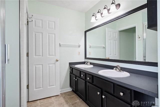 25 Huntley Ct, Springboro, OH 45066 - bathroom with double vanity and baseboards