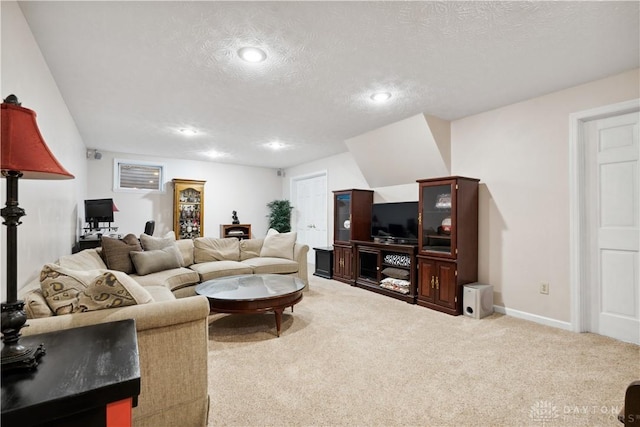 25 Huntley Ct, Springboro, OH 45066 - carpeted living room featuring a textured ceiling and recessed lighting