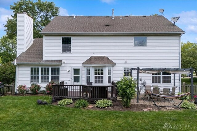 25 Huntley Ct, Springboro, OH 45066 - rear view of house featuring a pergola, a chimney, roof with shingles, and a deck