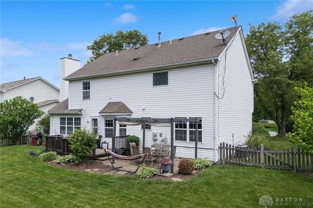 25 Huntley Ct, Springboro, OH 45066 - rear view of house with a fenced backyard, a shingled roof, a chimney, a wooden deck, and a pergola