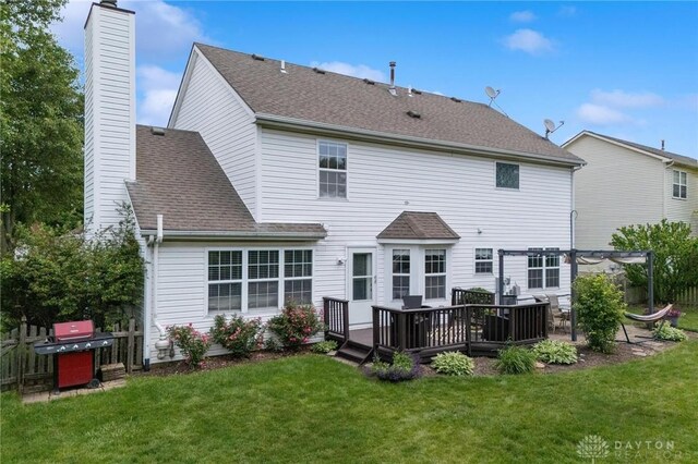 25 Huntley Ct, Springboro, OH 45066 - rear view of house with a chimney, a pergola, a wooden deck, and a shingled roof