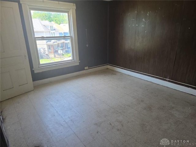 800 Linden Ave, Dayton, OH 45410 - unfurnished room featuring baseboards and tile patterned floors
