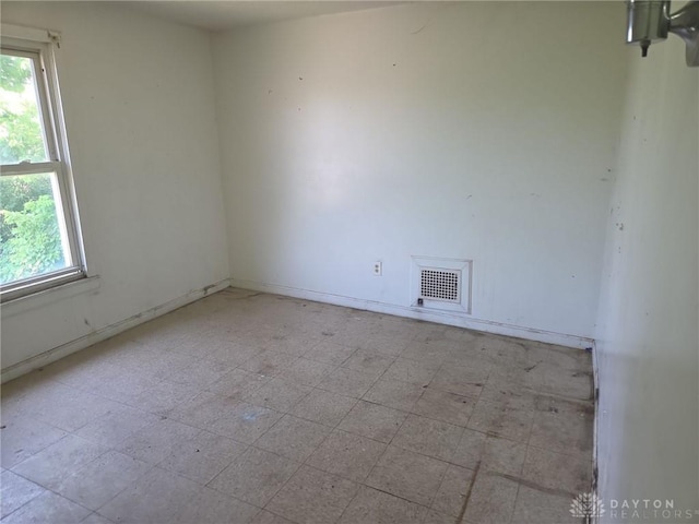 800 Linden Ave, Dayton, OH 45410 - empty room featuring healthy amount of natural light and tile patterned floors