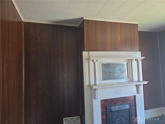 800 Linden Ave, Dayton, OH 45410 - detailed view of a tiled fireplace, crown molding, and wooden walls