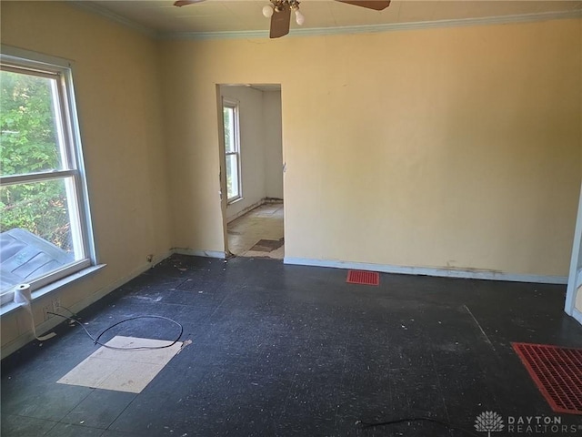 800 Linden Ave, Dayton, OH 45410 - unfurnished room with ornamental molding, plenty of natural light, a ceiling fan, and tile patterned floors