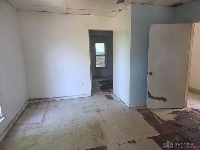 800 Linden Ave, Dayton, OH 45410 - unfurnished room featuring tile patterned floors and a paneled ceiling