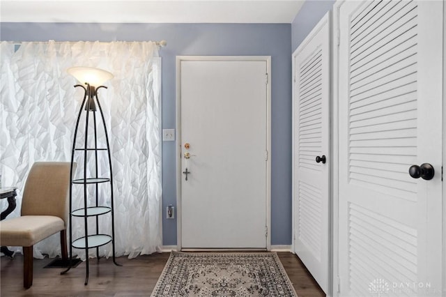 242 Poe Ln, Xenia, OH 45385 - entrance foyer with dark wood-style flooring