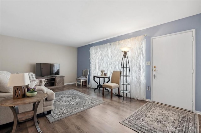 242 Poe Ln, Xenia, OH 45385 - living area with wood finished floors and baseboards