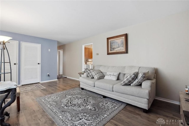 242 Poe Ln, Xenia, OH 45385 - living area with wood finished floors and baseboards