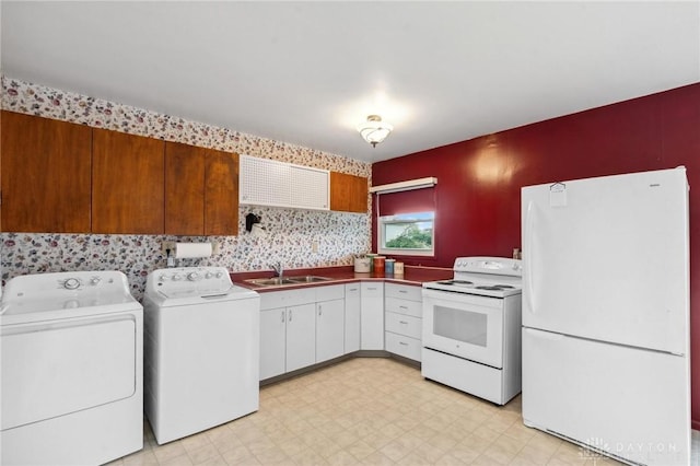 242 Poe Ln, Xenia, OH 45385 - washroom featuring washing machine and dryer and light flooring
