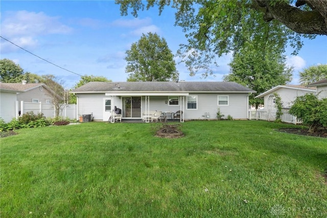 242 Poe Ln, Xenia, OH 45385 - back of house featuring a fenced backyard