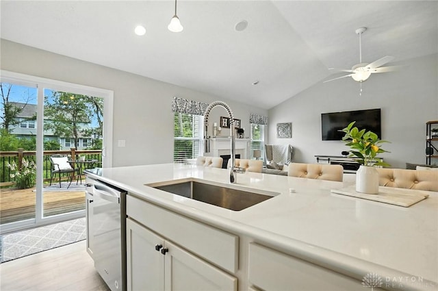 3109 Running Deer Trl, Franklin Twp, OH 45005 - kitchen with dishwasher, open floor plan, healthy amount of natural light, vaulted ceiling, and light countertops