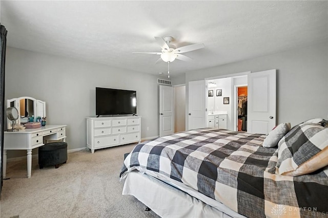 3109 Running Deer Trl, Franklin Twp, OH 45005 - bedroom featuring carpet, a walk in closet, ceiling fan, and a closet