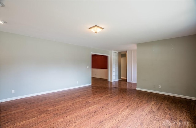187 Cheltenham Dr, Washington Twp, OH 45459 - empty room with wood finished floors and baseboards