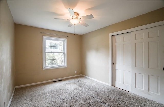 187 Cheltenham Dr, Washington Twp, OH 45459 - unfurnished bedroom with carpet, a closet, and ceiling fan