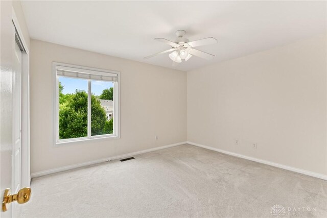 9764 Olde Georgetown Way, Dayton, OH 45458 - spare room featuring carpet floors and a ceiling fan