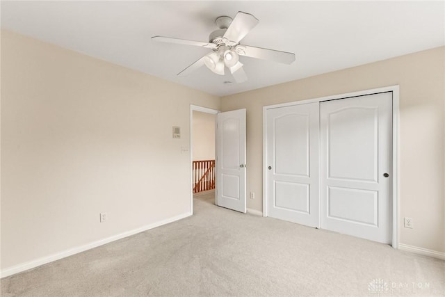 9764 Olde Georgetown Way, Dayton, OH 45458 - unfurnished bedroom with light colored carpet, a closet, and a ceiling fan