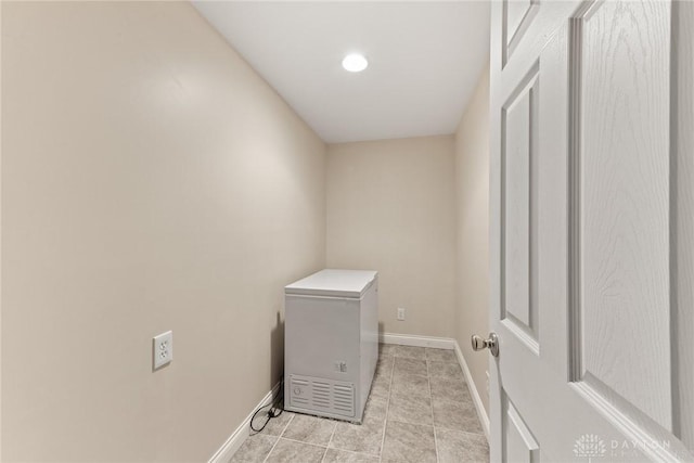 9764 Olde Georgetown Way, Dayton, OH 45458 - laundry room with light tile patterned flooring and recessed lighting