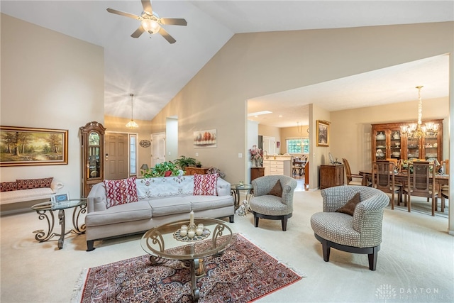 866 Deer Run Rd, Centerville, OH 45459 - carpeted living area with high vaulted ceiling, ceiling fan, and a chandelier