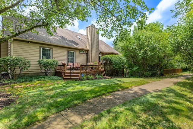 866 Deer Run Rd, Centerville, OH 45459 - rear view of house featuring a wooden deck, a chimney, a lawn, a shingled roof, and an outdoor hangout area